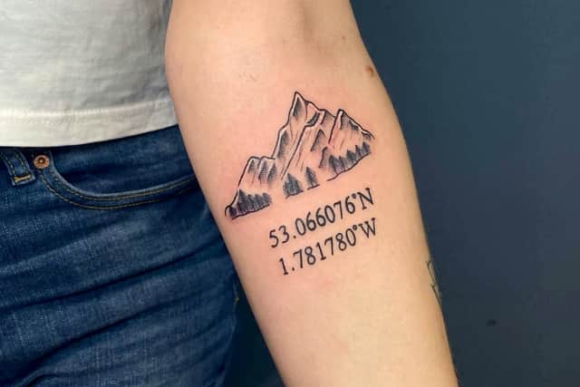Charlene Machin's tattoo showing the coordinates of where her boyfriend proposed to her.in Derbyshire