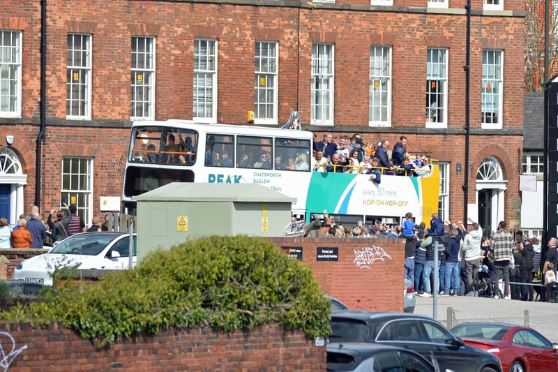 Chesterfield FC open top bus  and celebrations. Players and family waving to the crowds on route.