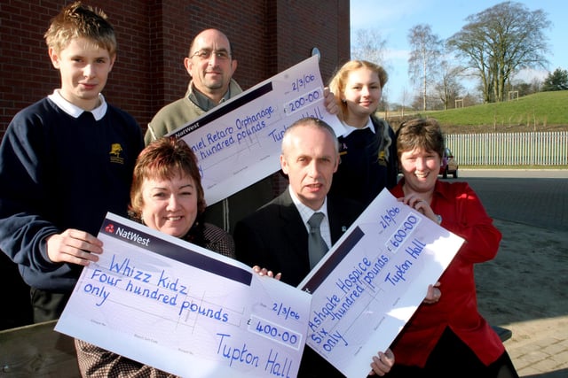 Tupton Hall Year 9 & 10 pupils raised £1200 in a Christmas Raffle back in 2006. Pictured are Yr 10 Pupil, Josh Stanley, Pastor Chris Cooper, and Yr 9 Pupil Abbey-Jo Moores, fl-r: Julie Hall from Whizz Kids, Head Teacher Patrick Cook and Emily Evans From Ashgate Hospice.