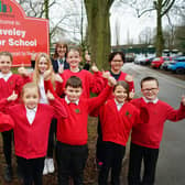 Pupils and staff at Staveley Junior School are celebrating a ‘good’ Ofsted report following a recent inspection. Above is headteacher Sue Parkes with members of the school parliament.