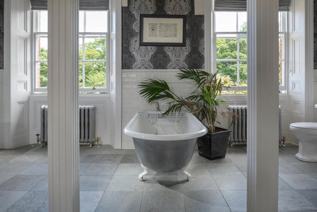 The bathroom has a modern feel in contrast to the period features seen in the rest of the property.