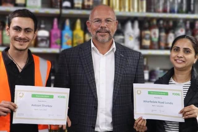 Yodel CEO Mike Hancox meets store owners Mr & Mrs Modhvadia