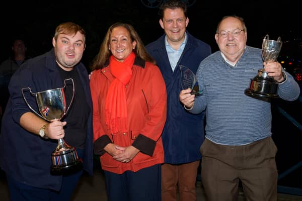 Mark (left) and Ian Page receive the Arkwright and Centenary Cups from Sophie and Rupert Pugh.