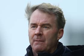 John Sheridan is being linked with the manager's position at Wigan Athletic.