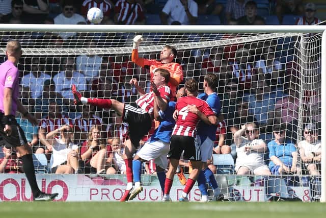 Chesterfield goalkeeper Ryan Boot punches clear in the pre-season stalemate with Sheffield United. Pic by Tina Jenner
