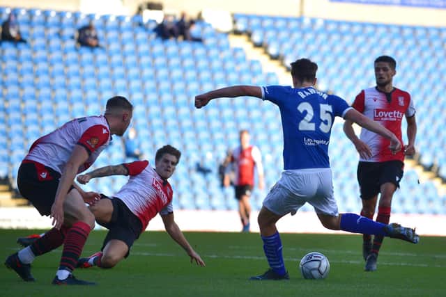 Luke Rawson curls home his second of the match in Chesterfield's 4-0 win against Woking.
