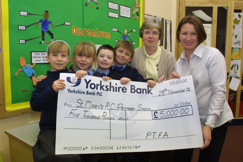 St Marys Primary School pupils during a bumper cheque presentation.