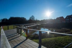 The pond and boardwalk at Bellway’s Curzon Park in Wingerworth, which provides an interesting focal point for the development.