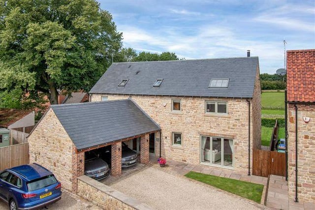 This five bedroom house has log burner, countryside views and modern open-plan kitchen. It is marketed by Richard Watkinson & Partners, 01623 355090.