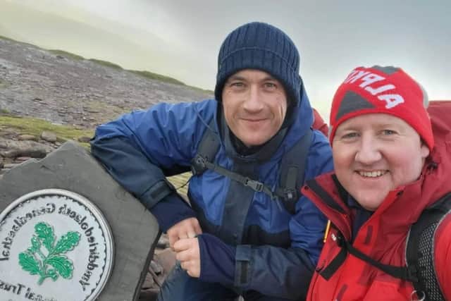 Mark and John on a test run up Pen Y Fan without the log. (Photo: Contributed)