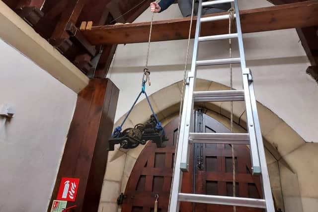 There's currently a 15ft climb up a ladder to get to the housing of the church clock.