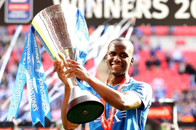 Craig Westcarr celebrates with the trophy after Chesterfield won the Johnstone's Paint trophy final on March 25, 2012.