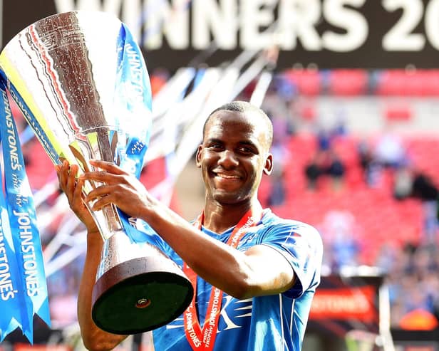 Craig Westcarr celebrates with the trophy after Chesterfield won the Johnstone's Paint trophy final on March 25, 2012.