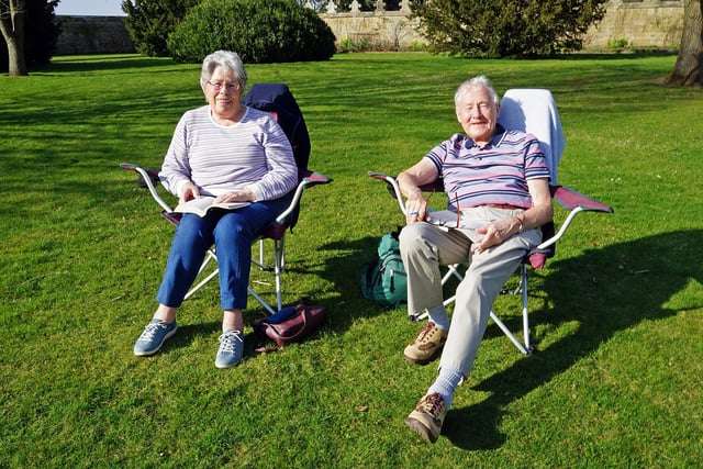Enjoying the sunny weather at Hardwick Hall. Anne and Alan Parker relaxing.