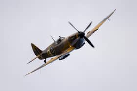 The Spitfire will pass over the site on Saturday and the Hurricane on Sunday in a British Memorial Flypast. (Photo by Finnbarr Webster/Getty Images)