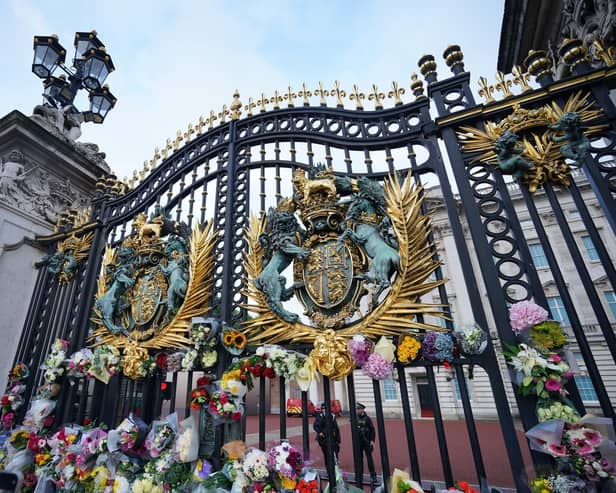 Flowers at Buckingham Palace, London, following the death of Queen Elizabeth II on Thursday.