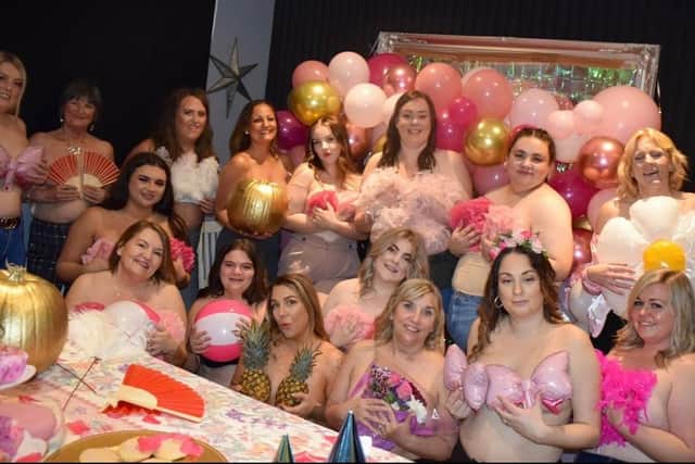 A group of courageous Derbyshire women have bared all to raise awareness of breast cancer and to support a colleague.