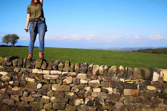 Tara enjoys challenging people's preconceptions about dry stone wall workers. (Photo: Contributed)