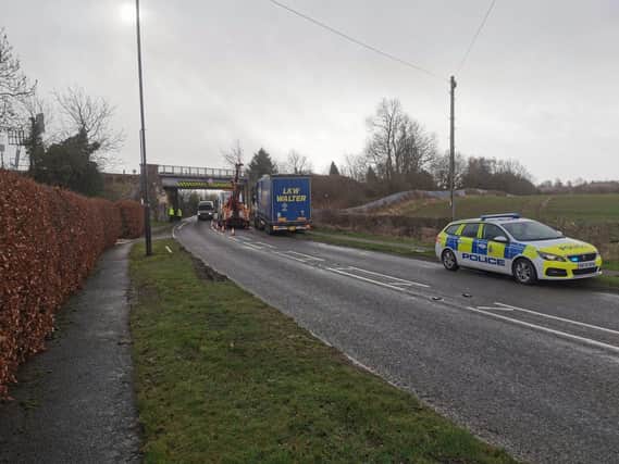 The lorry driver got his vehicle wedged under a bridge on Sheffield Road in Creswell this morning (February 18) (picture: Bolsover and Clowne Police SNT)
