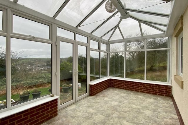 Bask in the spectacular views across Wirksworth to the countryside beyond from this spacious conservatory.