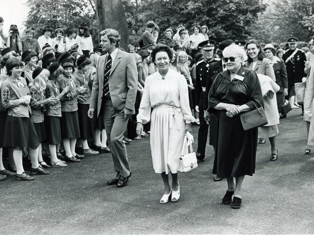 HRH Princess Margaret is escorted up the drive of Glenbrook, Bamford, the Guide Outdoor Activity Centre, by Lady Renwick (right), Chairman Glenbrook House Committee to the waving of flags and cheering of Guides and Ranger Guides - 4th June 1980