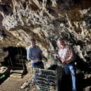 Barry Lewis and Rupert Pugh with the sparkling wine in Rutland Cavern