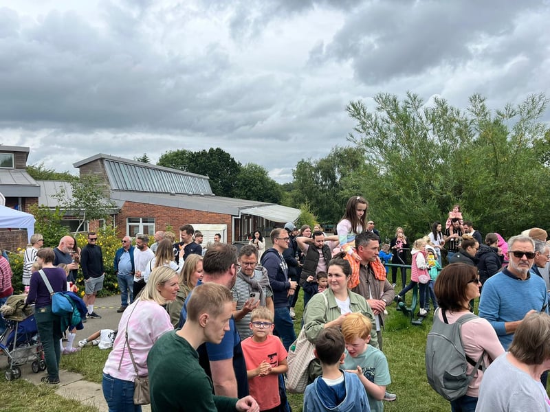 Families arrive for the summer fair and Red Arrows flypast.
