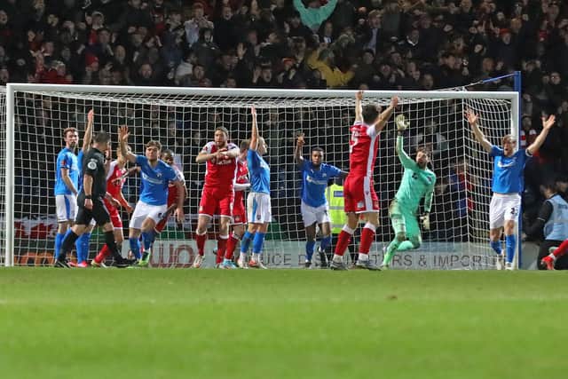 Chesterfield's players appealed for handball as Wrexham doubled their lead.