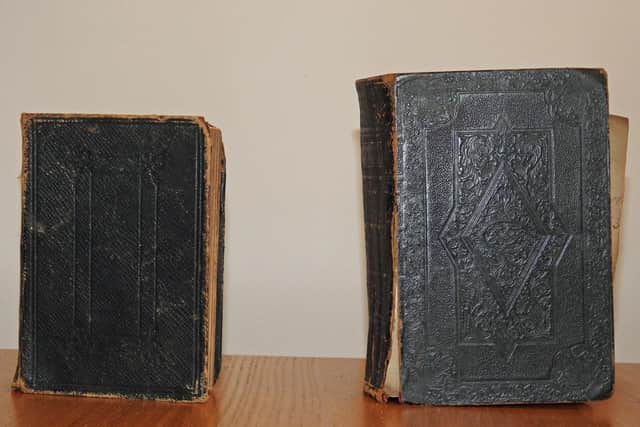 These two family Bibles belong to Andy Miles, of the Friends of Spital Cemetery.