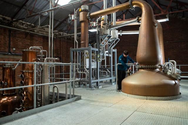 Head distiller, Shaun Smith, 32, checks on the stills. (Photo: Rod Kirkpatrick/F Stop Press)