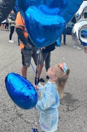 Sapphire had a personalised balloon captioned 'I love you daddy'