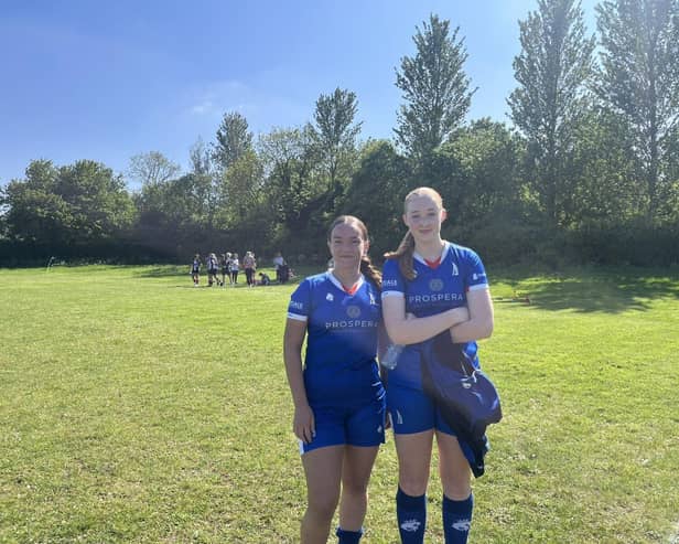 Chelsea Bailey and Millie Jebb-Geer shortly after the final whistle