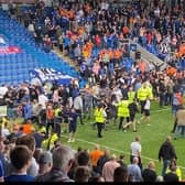 Oldham Athletic fans invaded the pitch at Chesterfield.