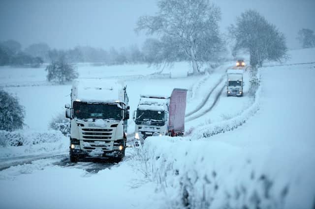 Lorries get stuck on the A515 after heavy snow fell in the Derbyshire Peak District near Biggin earlier this winter. Image: Rod Kirkpatrick/F Stop Press.