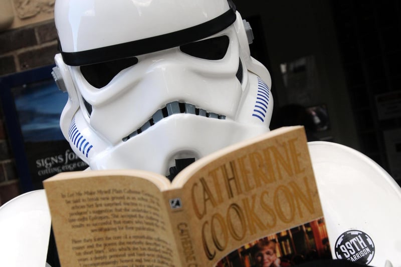 Now that's novel! Here is a reminder of a collectors Scifair at South Shields Museum in 2013 with a Star Wars Storm Trooper enjoying a Catherine Cookson novel.
Writer: