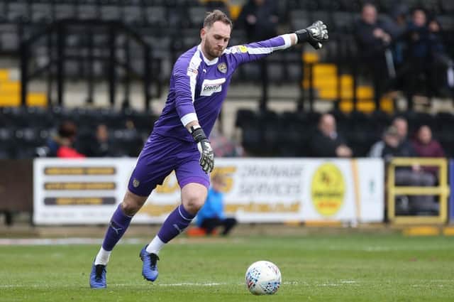 Ross Fitzsimons, pictured in action for Notts County, has rejoined the Spireites.