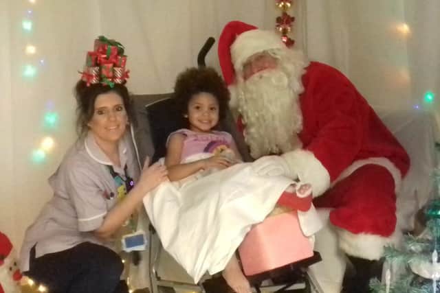 Father Christmas visits patients even if they can't always return home for Christmas