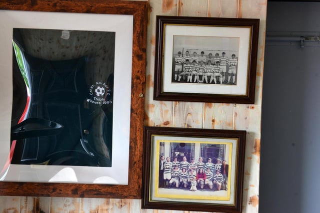 Relics from the pub's long history are hung on the walls.