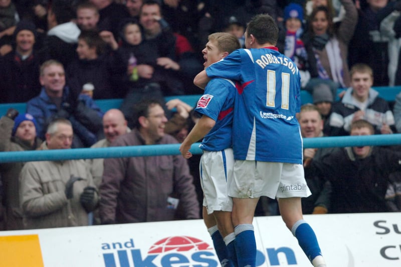 Jamie Ward celebrates Chesterfield's second  goal with Gregor Robertson.