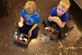 Beth's young sons enjoying their lunch boxes