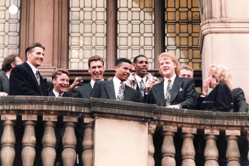 The players on Sheffield Town Hall balcony.