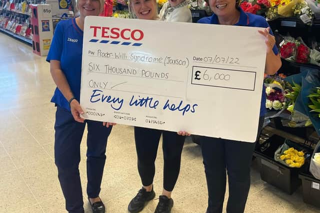 Tesco Chesterfield staff Jane Clavin, Claire Bushell and Taylamae Blair pictured with young Jaxson Potts