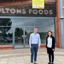 Lee and Cllr Charlotte Cupit outside Fultons Foods
