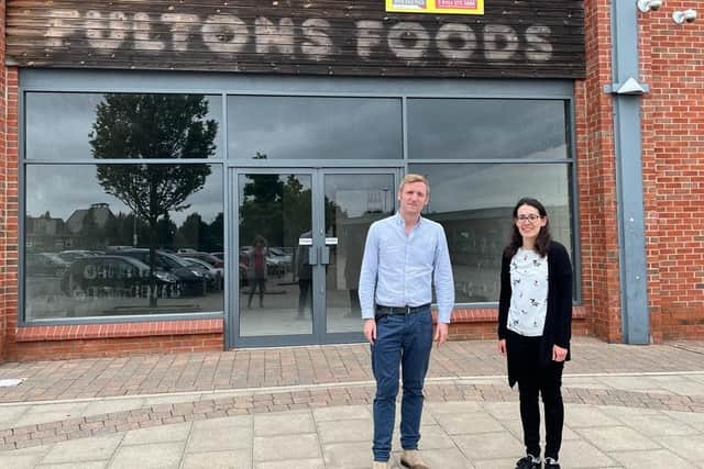 Lee and Cllr Charlotte Cupit outside Fultons Foods