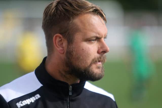 Belper Town manager Grant Black has extended his contract with the club.