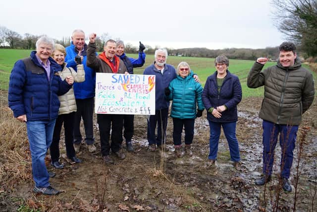 Old Tupton residents celebrate after a developer withdrew plans to build 300 homes on green fields near their homes.