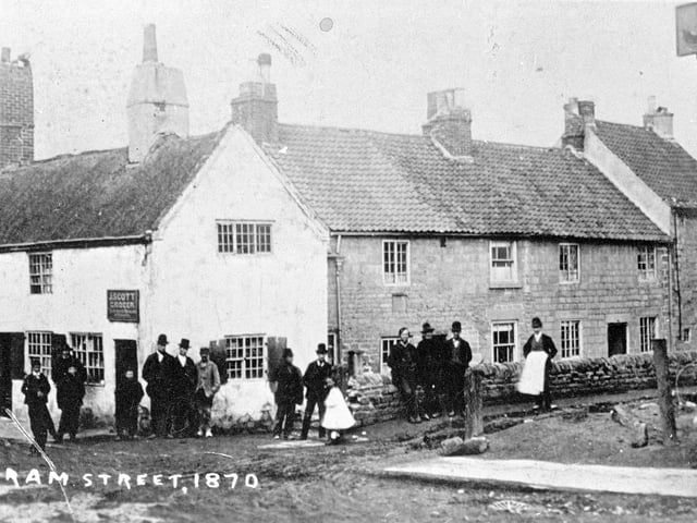 Tenter Lane 1870. 
The cottages stood on the site of the Coop Building, now Wilkinson's. 
The street was renamed Outram Street after landowner Mr T Outram.