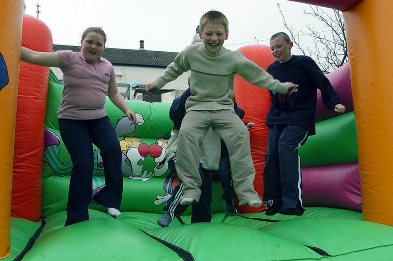 The bouncy castle got lots of use from these happy youngsters at the Station Hotel Easter fun day in  2003. Have you spotted a familiar face?