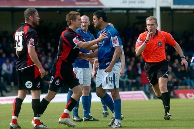 Tempers flare between Jack Lester and Bournemouth's Shaun Cooper in the last match at Saltergate.