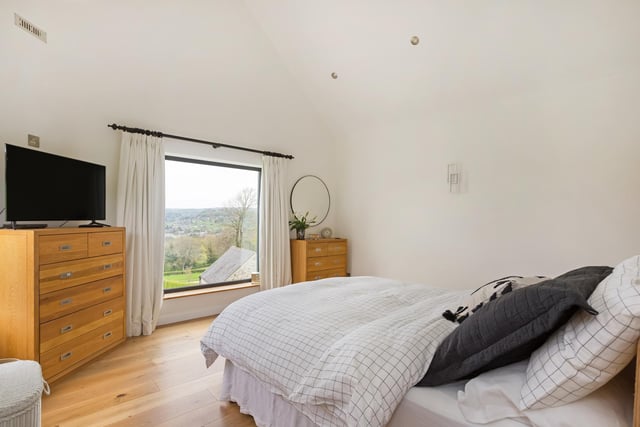 Picture yourself waking up to this view every morning! The principal bedroom has a walk-through dressing room with fitted wardrobes, drawers and shelving and an en-suite with shower enclosure and underfloor heating.